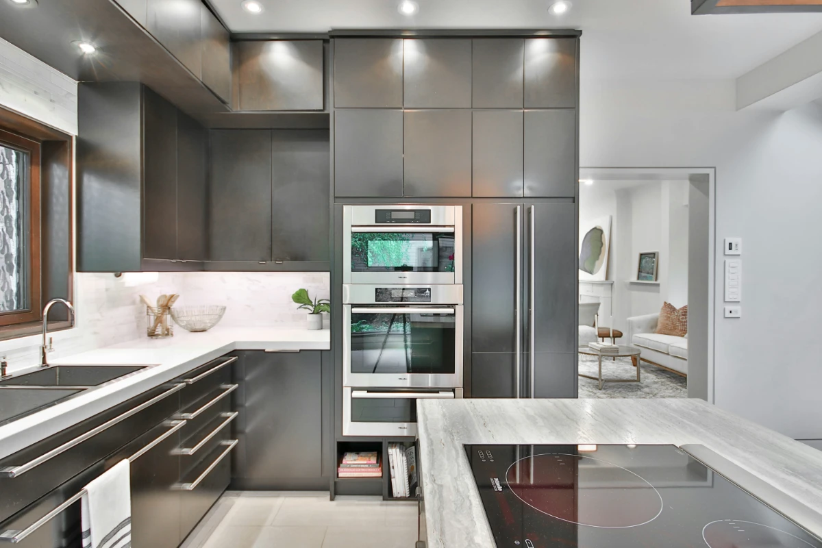 Modern renovated kitchen in Brandon Manitoba with custom cabinets and stone countertops